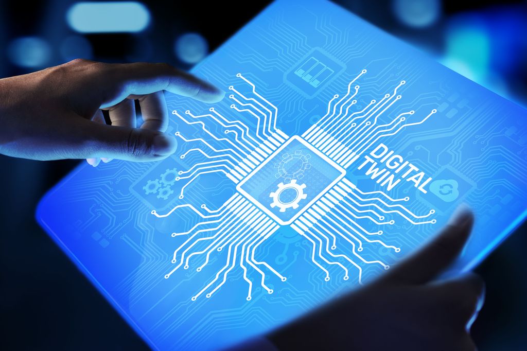 Close-up of fingers touching a tablet screen that displays a blue circuit board graphic with the words 'DIGITAL TWIN' and accompanying technology icons, emphasising the concept of a digital twin in technology.