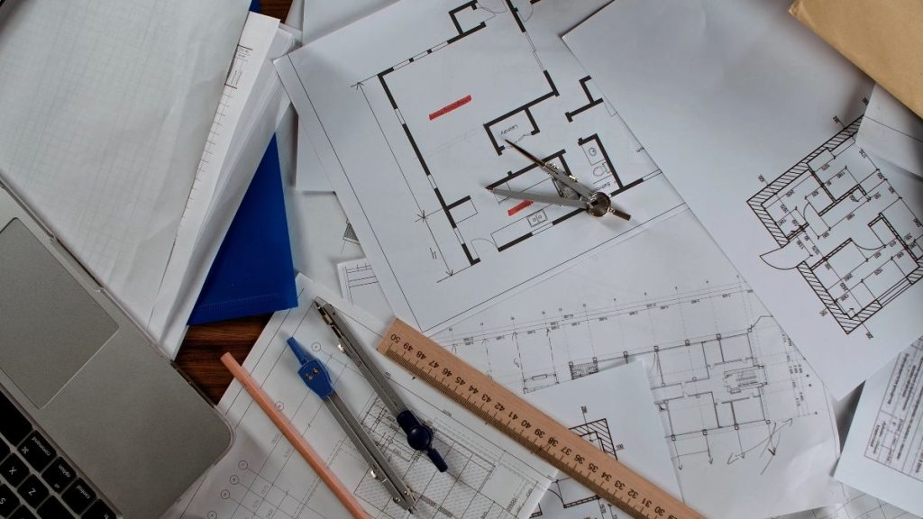 Building Safety Levy Floor Area Calculations Architectural plans and measuring tools used to calculate residential floor area